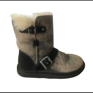 UGG Black crackle fur-lined boots with buckle detail.  *Like new*